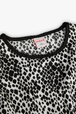 Abito in maglia per bambina con stampa in bianco e nero.