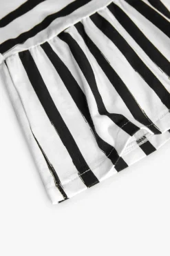Abito in maglia per bambina con design a righe in bianco e nero.