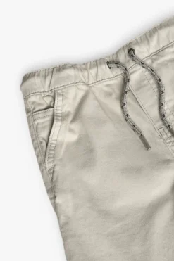 Bermuda di gabardina elasticizzata per bambino di colore beige