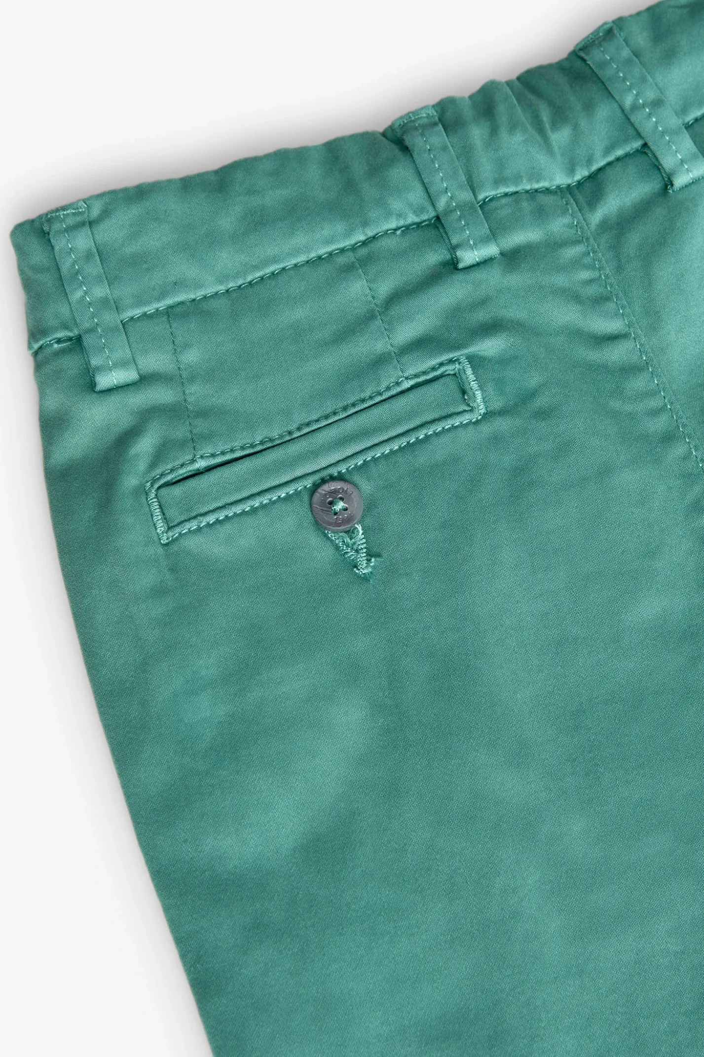 Bermuda in raso per bambino di colore verde