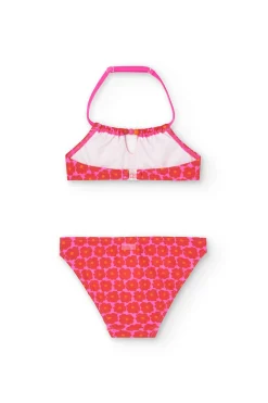 Bikini in poliammide per bambina con stampa floreale di colore rosa.