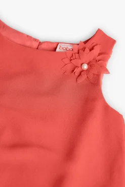 Blusa di chiffon per bambina di colore rosso.