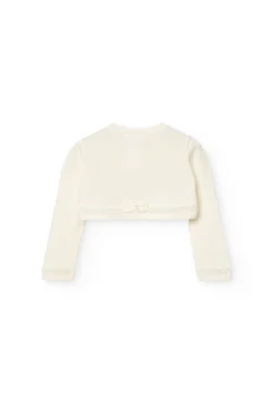Bolero in maglia per neonata in bianco.