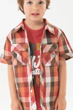 Camicia in popeline per bambino con quadri in tonalità calde.