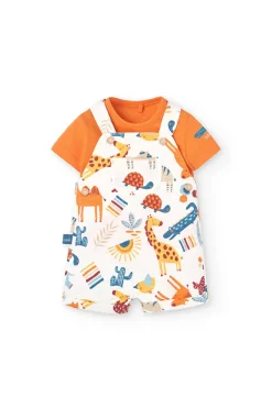 Completo composto da maglietta e salopette a maglia per neonato in colore arancione.