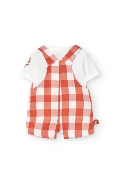 Completo coordinato in maglia per neonato in arancione e bianco con motivo a quadri.