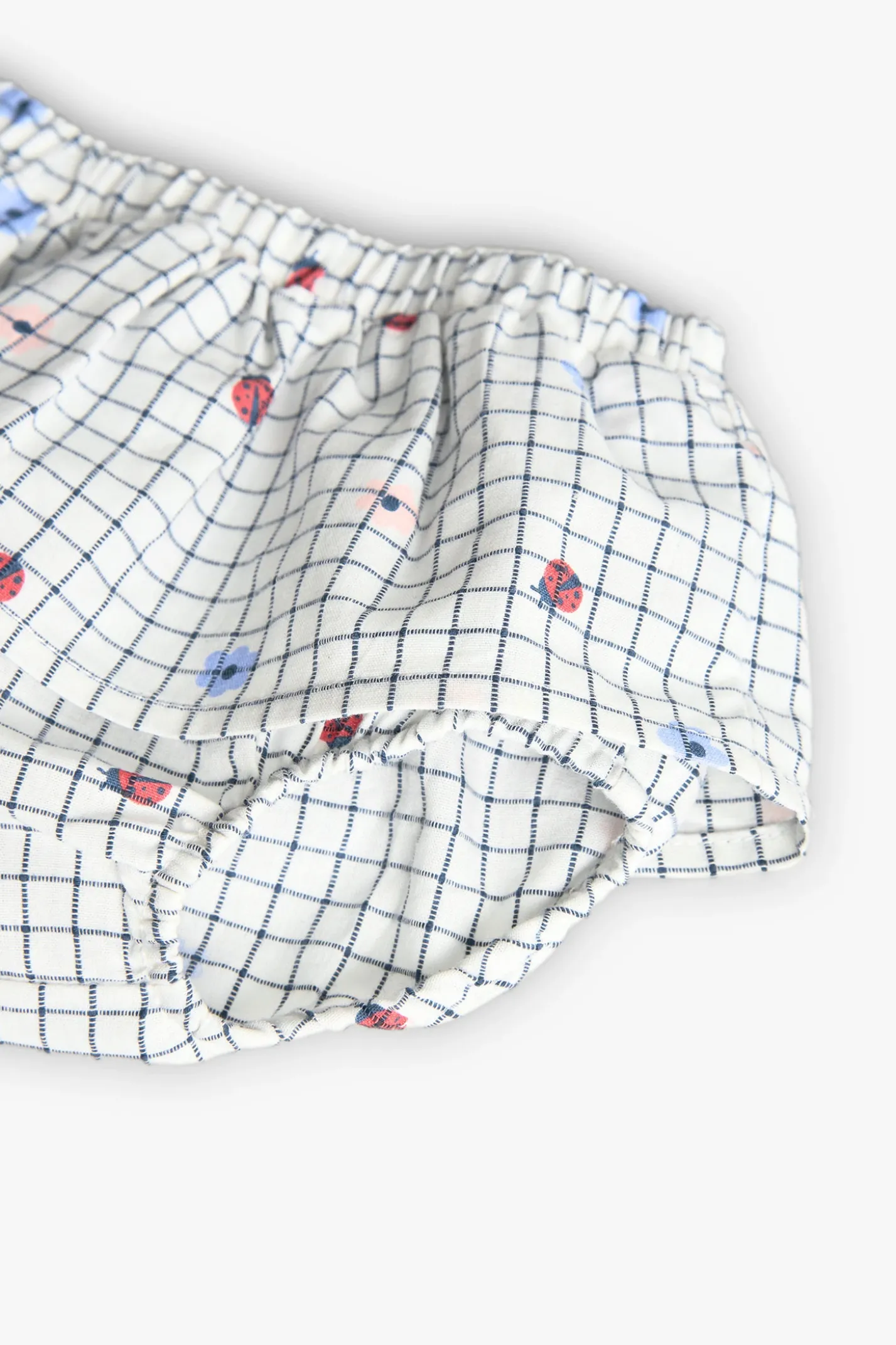 Completo coordinato in maglia per bambina in rosa con stampa di coccinella.