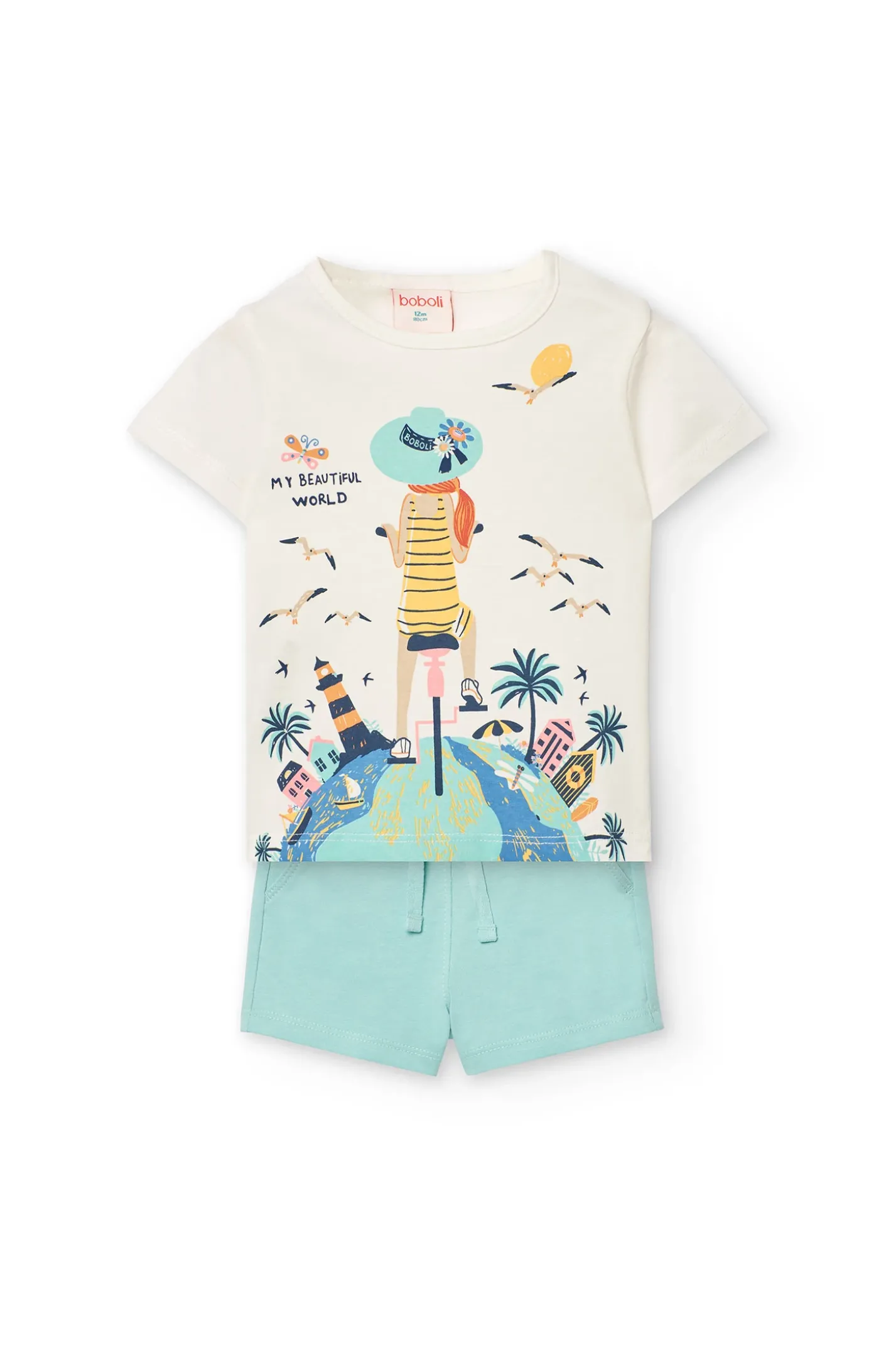 Completo di maglietta e pantaloncini a maglia per neonata di colore bianco.