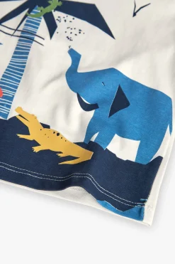 Completo di maglietta e pantaloncini in maglia per bambino in colore bianco.