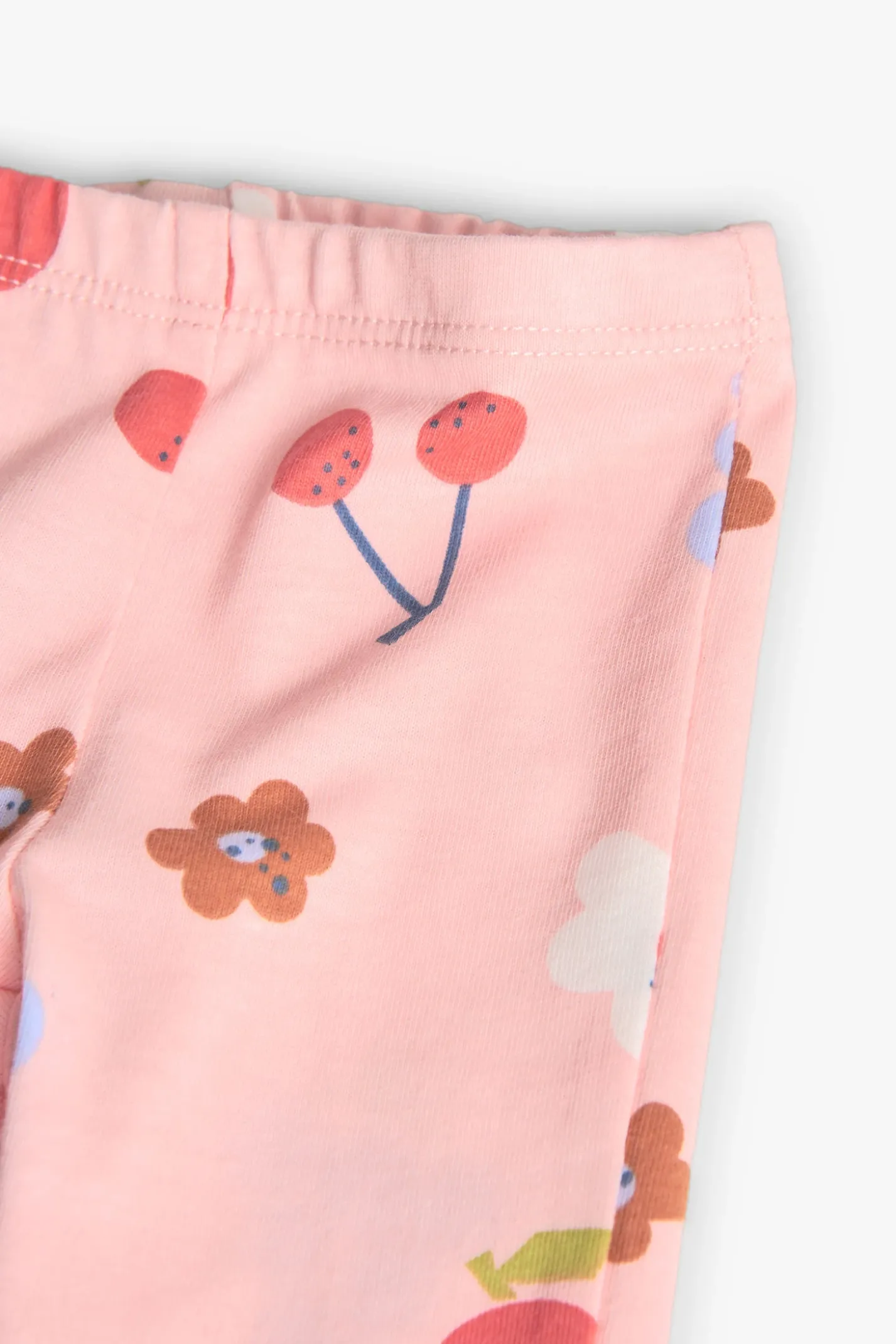 Completo di maglietta e pantaloni in maglia per neonata con stampa floreale.