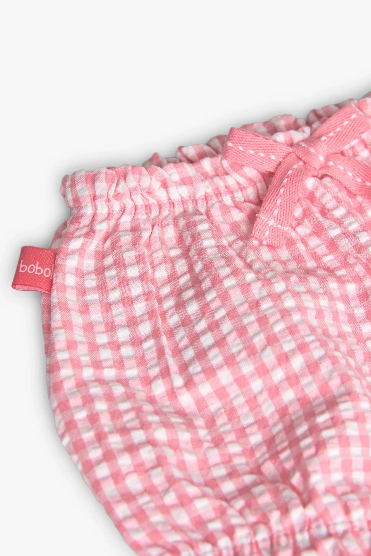 Completo in maglia per bambina neonata in colore bianco