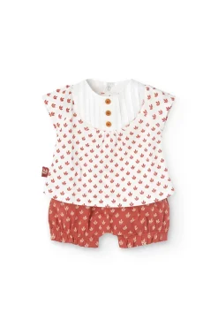 Completo in maglia per neonata con stampa floreale in rosso.
