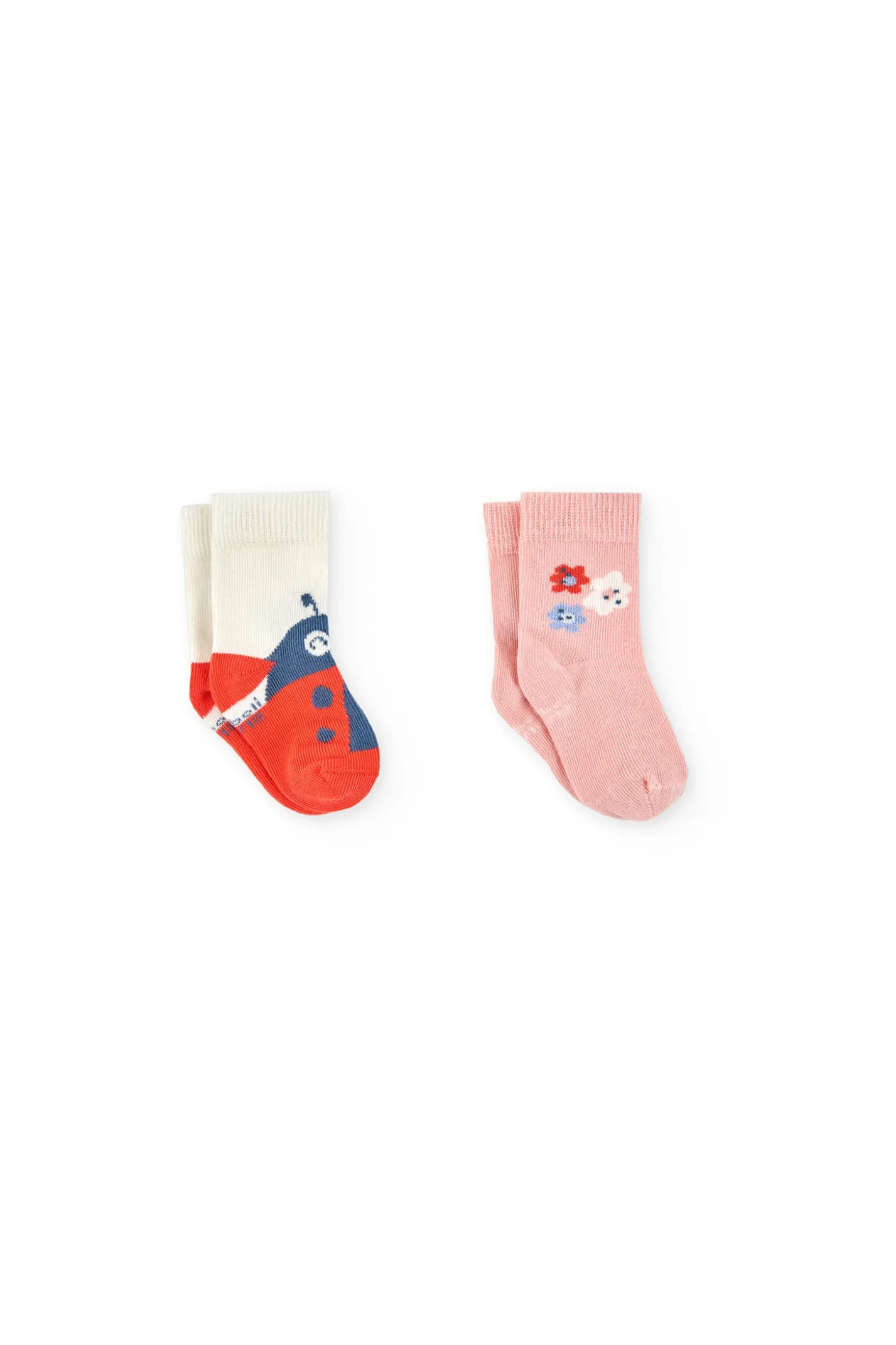 Confezione di calzini a maglia per neonata in colore rosa.