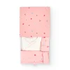 Coordinato in maglia per bambina in bianco e rosa.