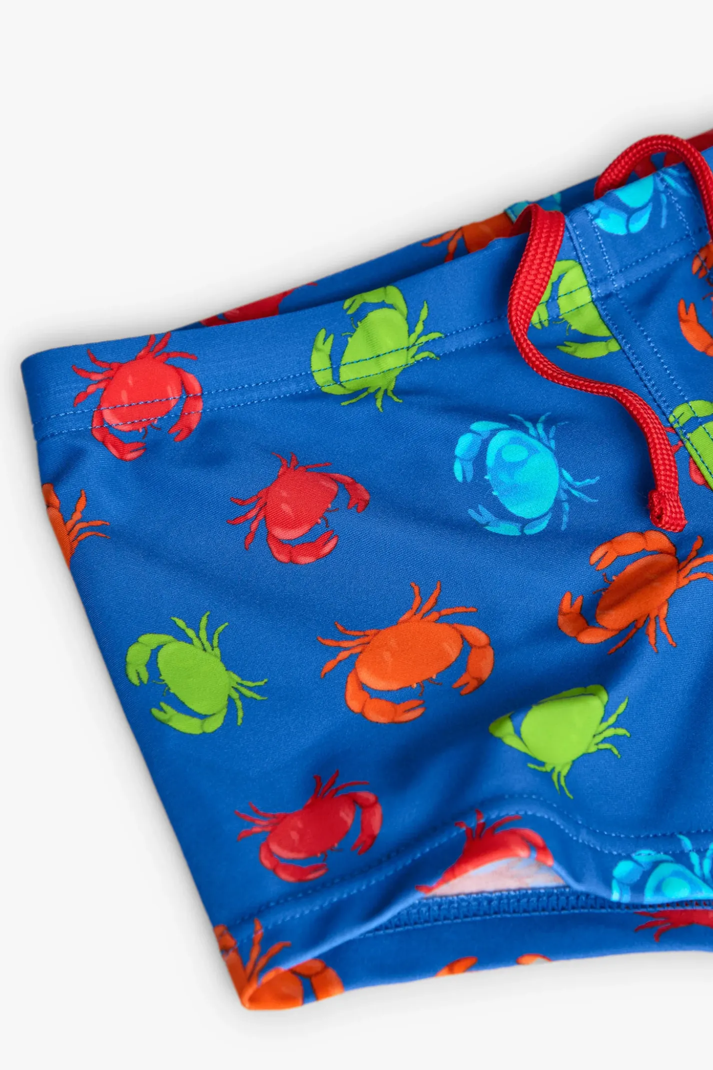 Costume da bagno in poliammide per bambino di colore blu con motivo di granchi.