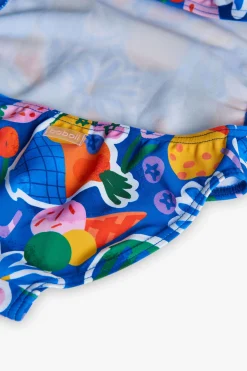 Costume da bagno in poliammide per bambina con stampa di frutta e fiori in colore blu.