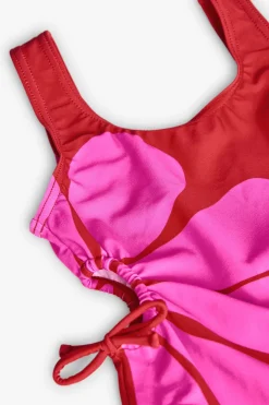 Costume da bagno in poliammide per bambina di colore granata.