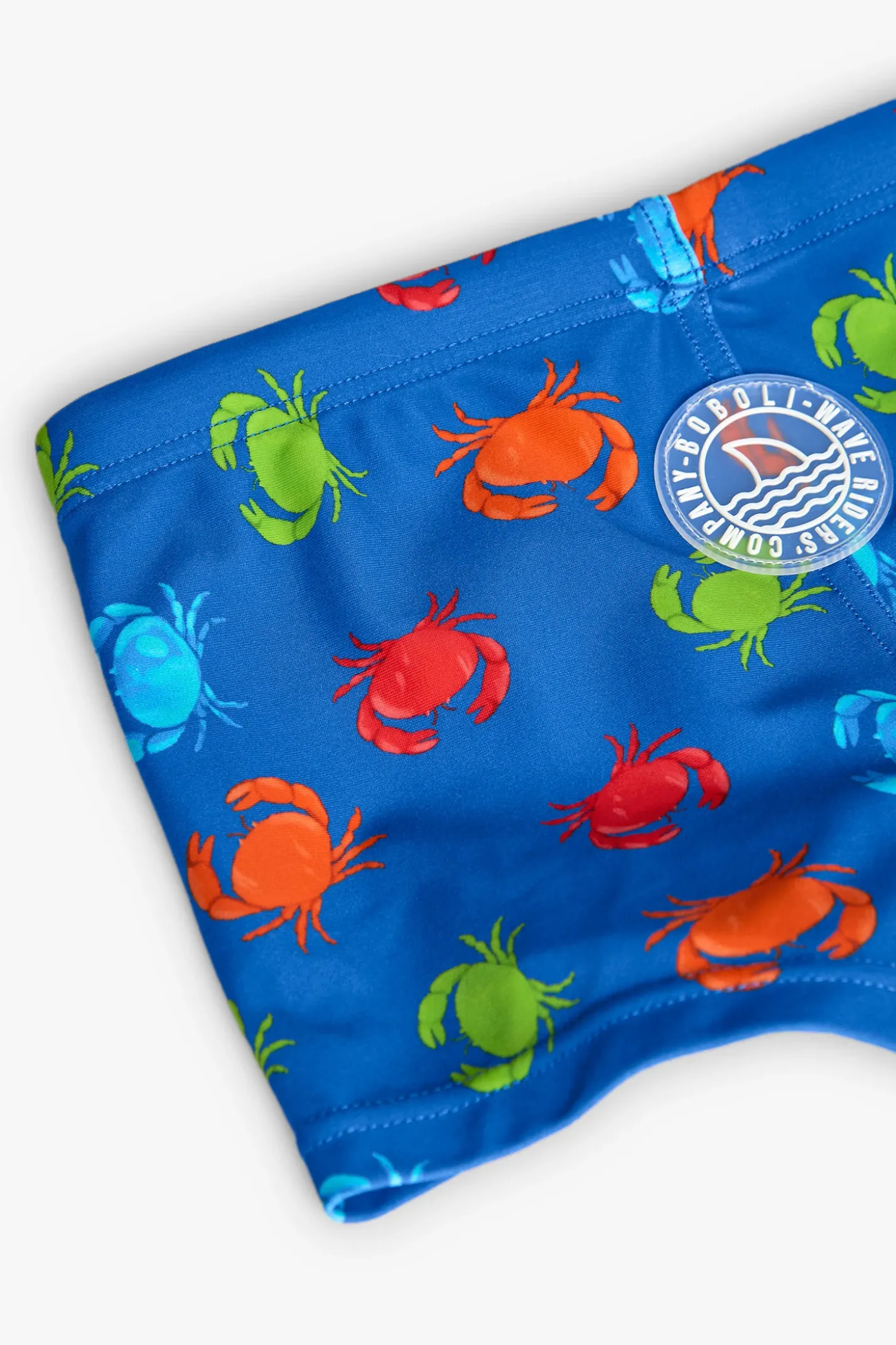 Costume da bagno in poliammide per bambino di colore blu con motivo di granchi.