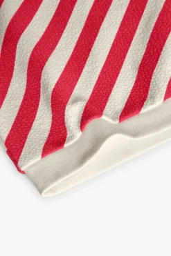 Felpa a maglia per bambina in colore rosso e bianco
