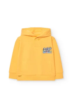 Felpa per neonato di colore giallo.