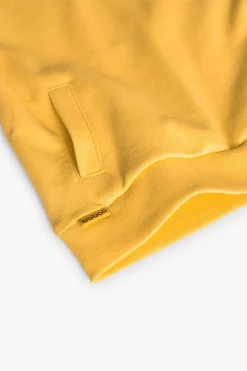 Felpa per neonato di colore giallo.