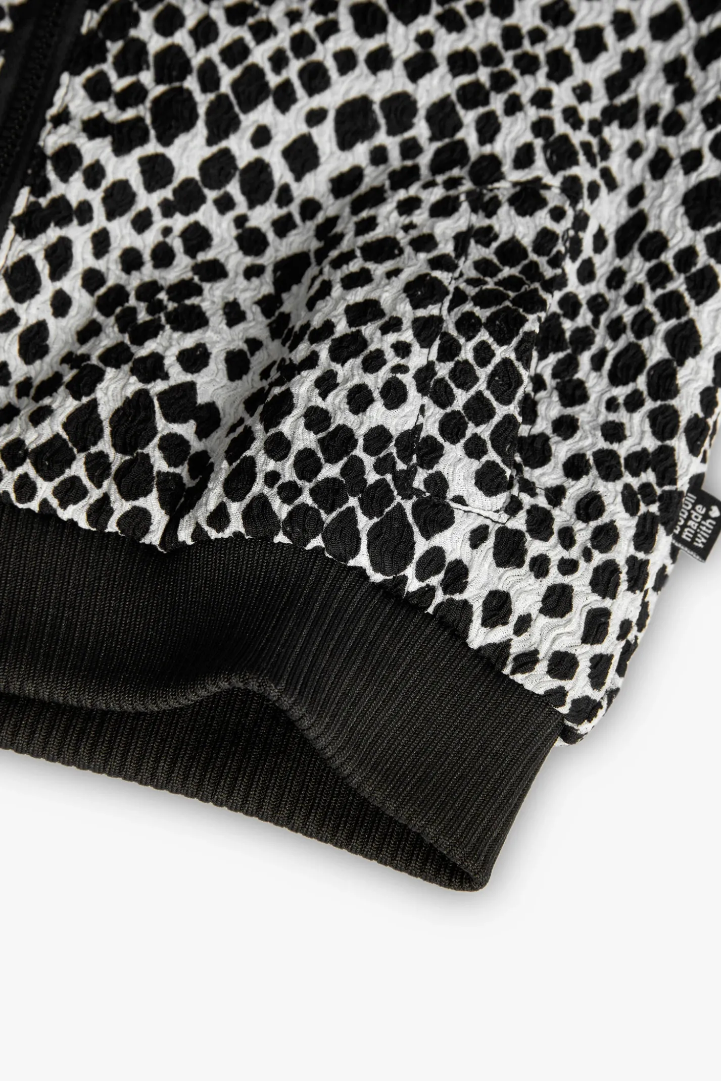 Giacca a maglia per bambina in bianco e nero estampato