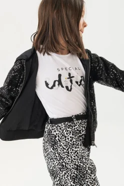 Giacca con paillettes per bambina di colore nero.