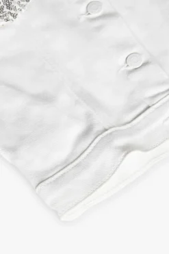 Giacca in tessuto elasticizzato per bambina di colore bianco