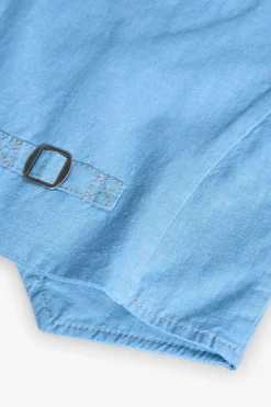 Gilet di lino per bambino in colore azzurro.
