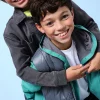 Gilet reversibile per bambino in colore grigio e verde