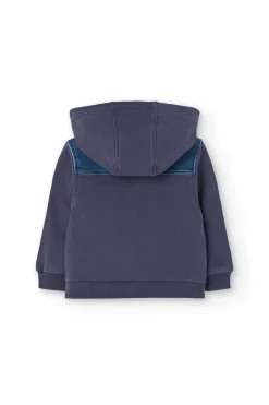 Giubbino denim in maglia per neonato di colore blu con cappuccio.