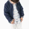 Giubbotto reversibile per bambino color blu navy.