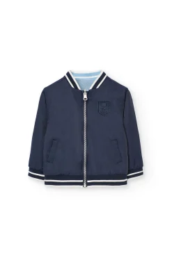 Giubbotto reversibile per bambino color blu navy.