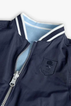 Giubbotto reversibile per bambino color blu navy.