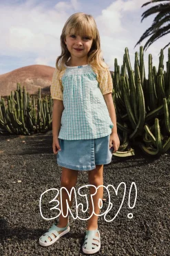 Gonna-pantaloncino in denim per neonata in colore bleach