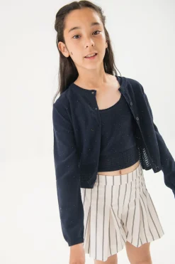 Gonna-pantaloncino in maglia per bambina con righe in bianco e nero.
