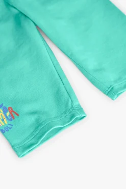 Leggings a maglia per bambina in colore verde.