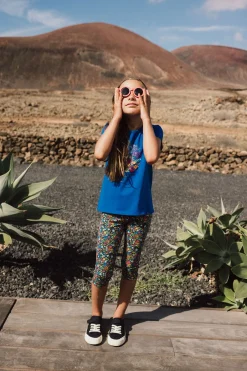Leggings capri in maglia per bambina con stampa floreale