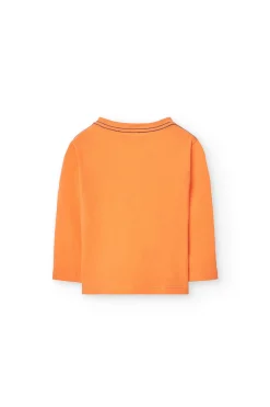 Maglietta a maglia per bambino in arancione a maniche lunghe.