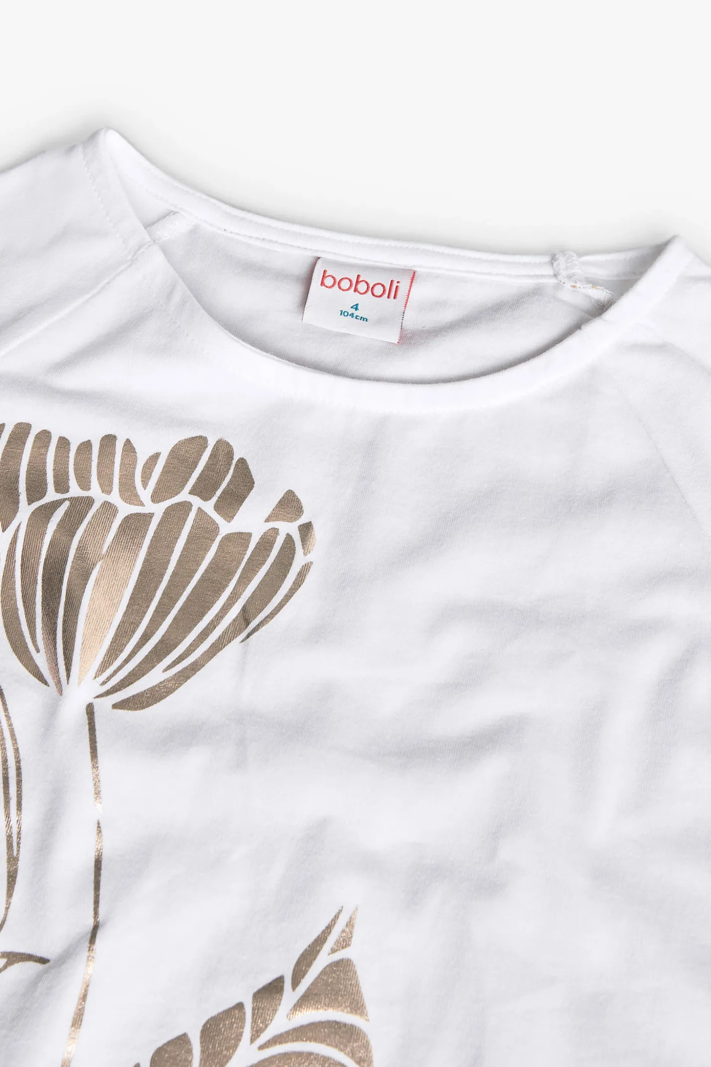Maglietta a maglia per bambina di colore bianco con disegno di un fiore