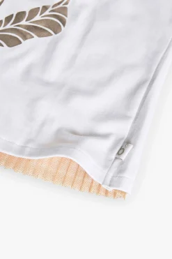 Maglietta a maglia per bambina di colore bianco con disegno di un fiore