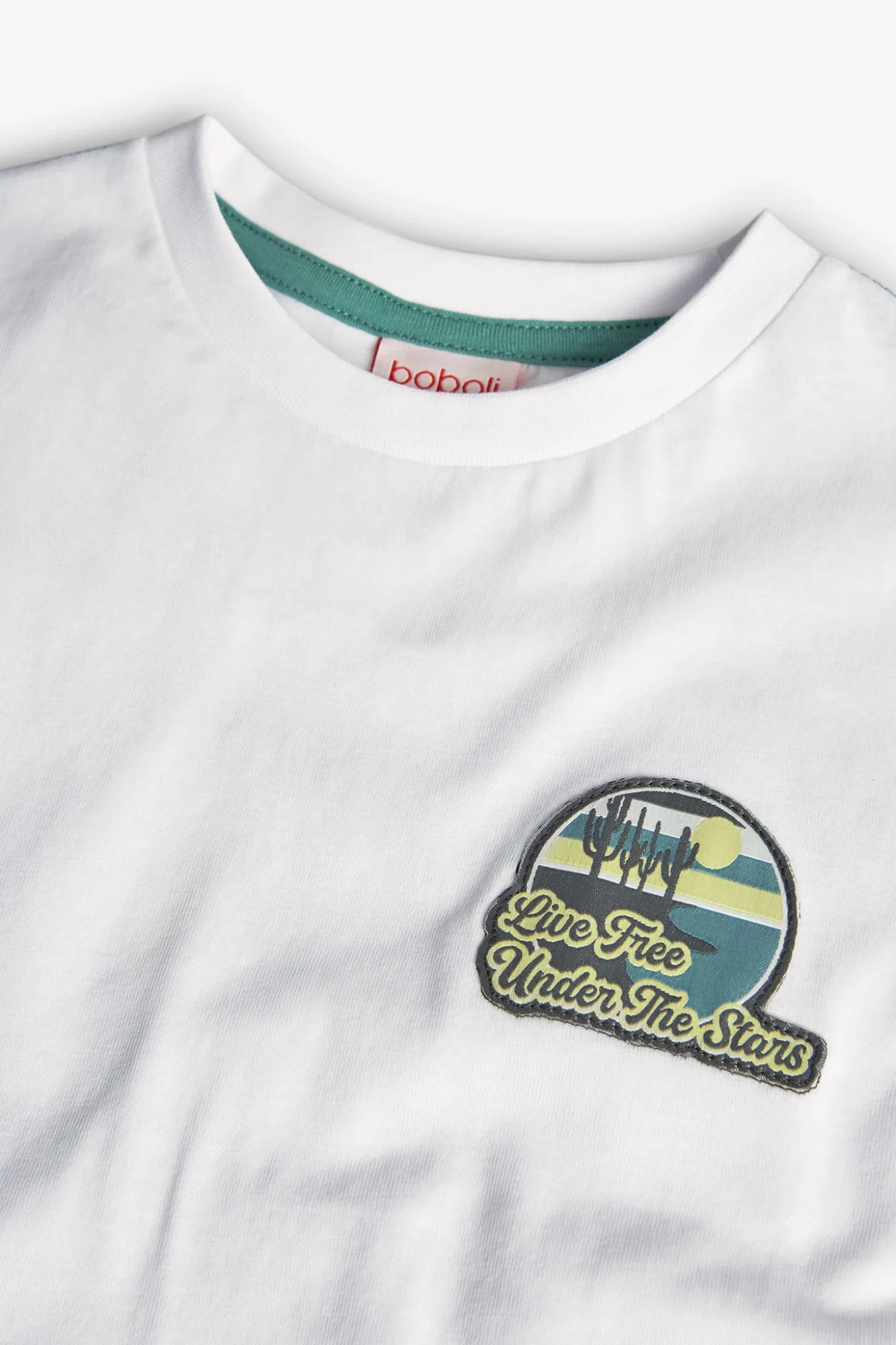 Maglietta a maglia per bambino in bianco con stampa