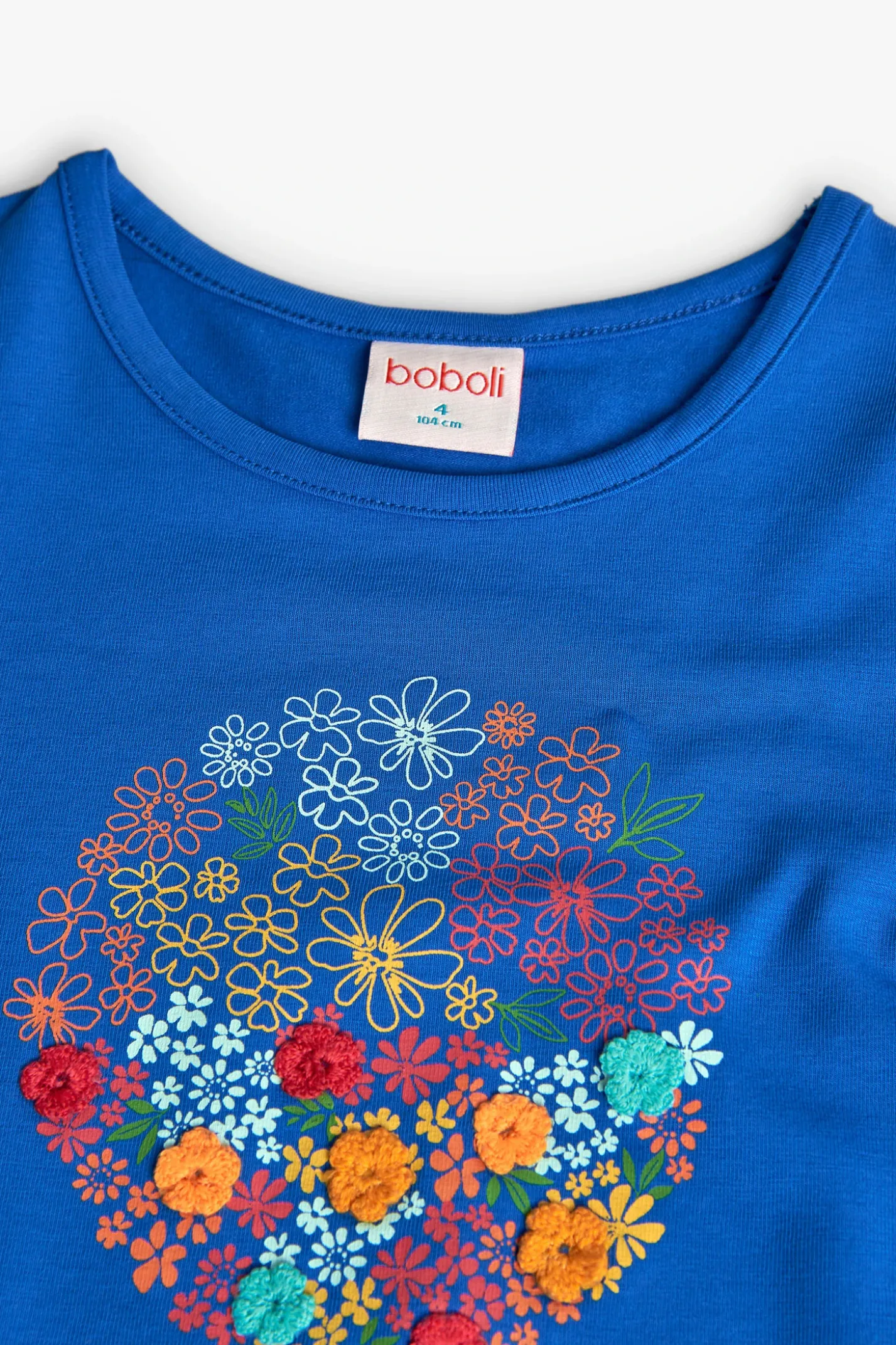 Maglietta a maglia per bambina di colore blu.