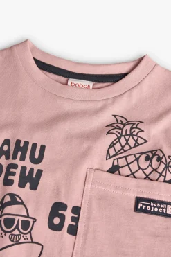 Maglietta a maglia per bambino in colore rosa.