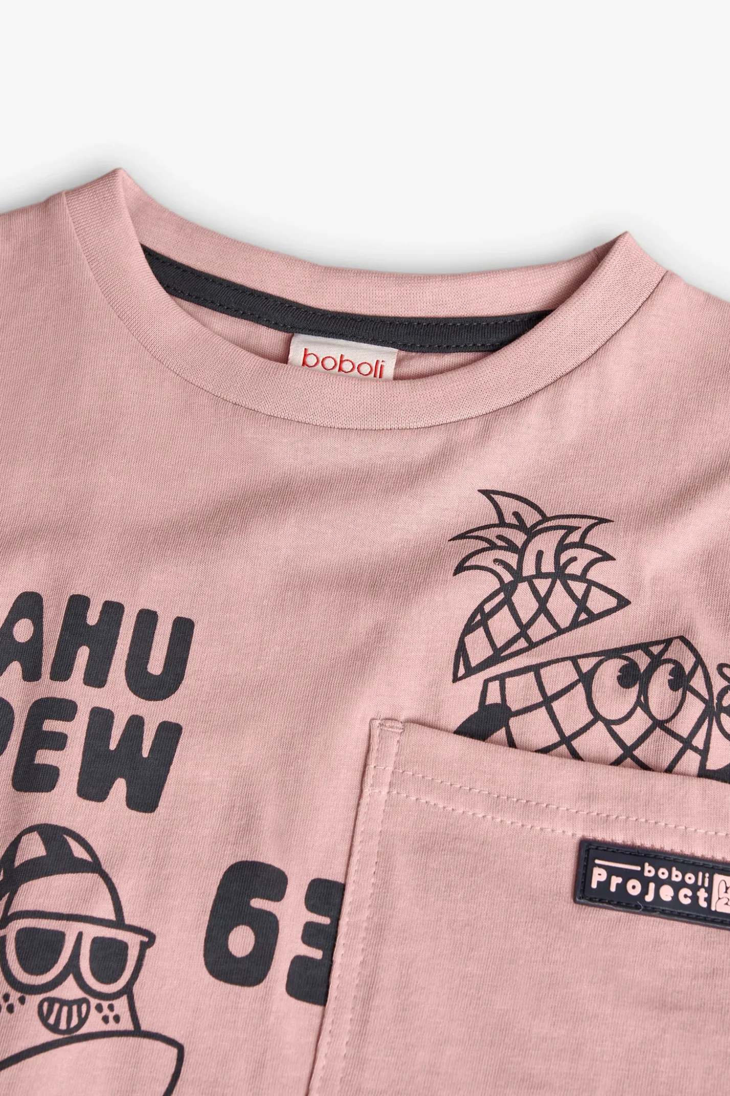 Maglietta a maglia per bambino in colore rosa.