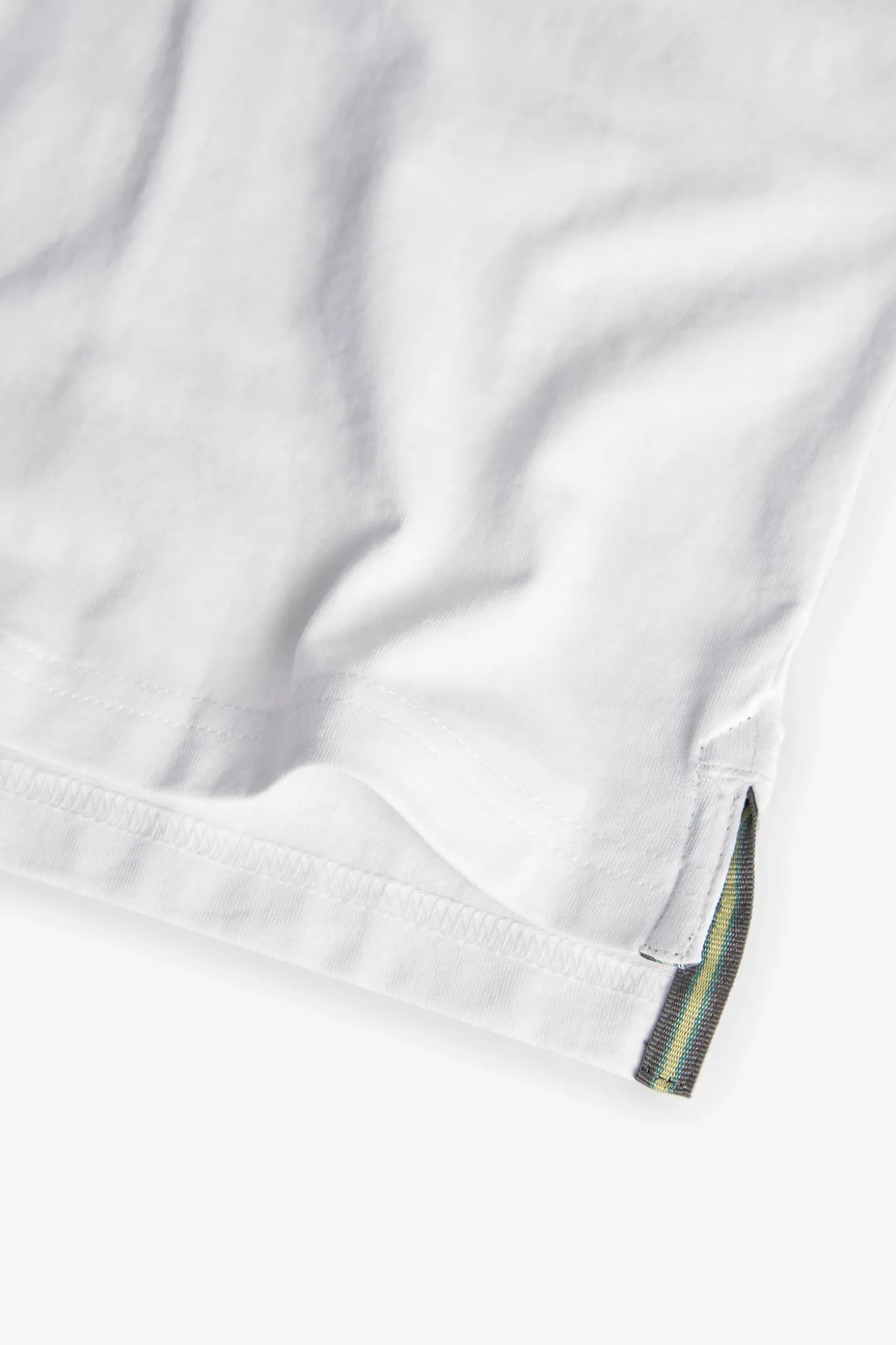 Maglietta a maglia per bambino in bianco con stampa