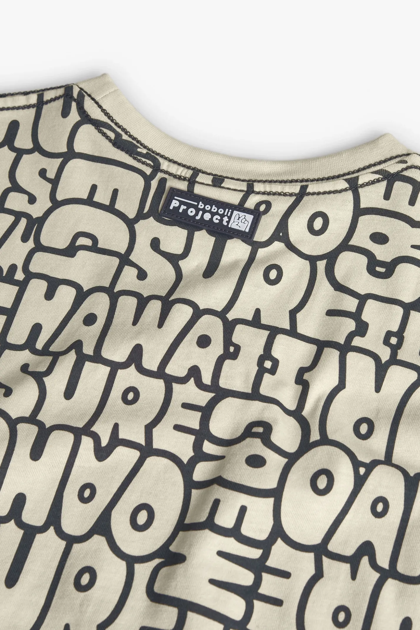 Maglietta a maglia per bambino con stampa in color crema
