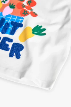 Maglietta a maglia per bambina di colore bianco.