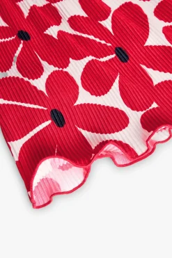 Maglietta a maglia per bambina con stampa floreale in rosso e bianco