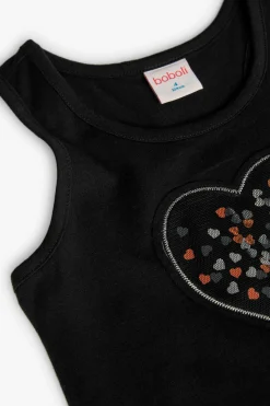 Maglietta a maglia per bambina di colore nero con motivo a cuore.